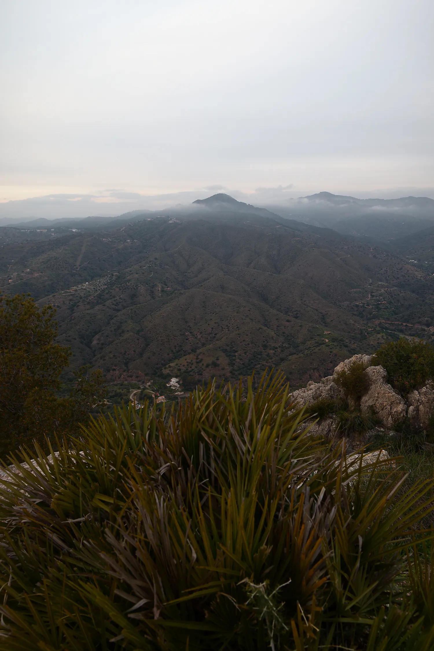 malaga mountains in clouds